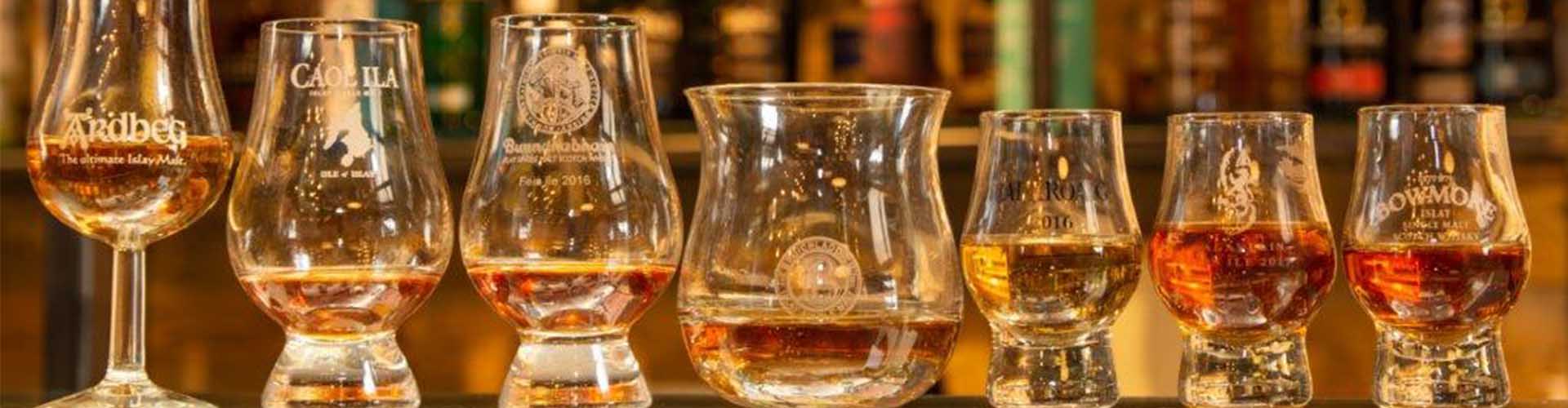 A selection of Islay whiskies on their dram glasses