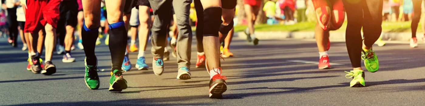 People's legs running a marathon