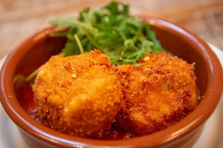 A close up of a breaded starter dish at Peatzeria on Islay