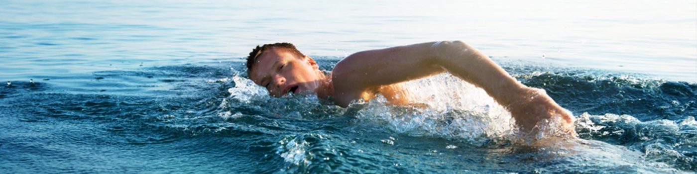 A man wild swimming