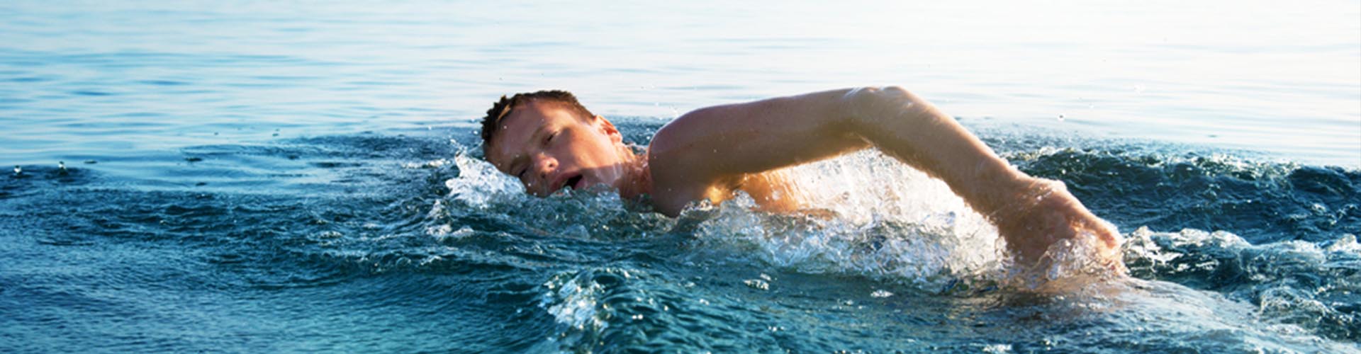 A man wild swimming