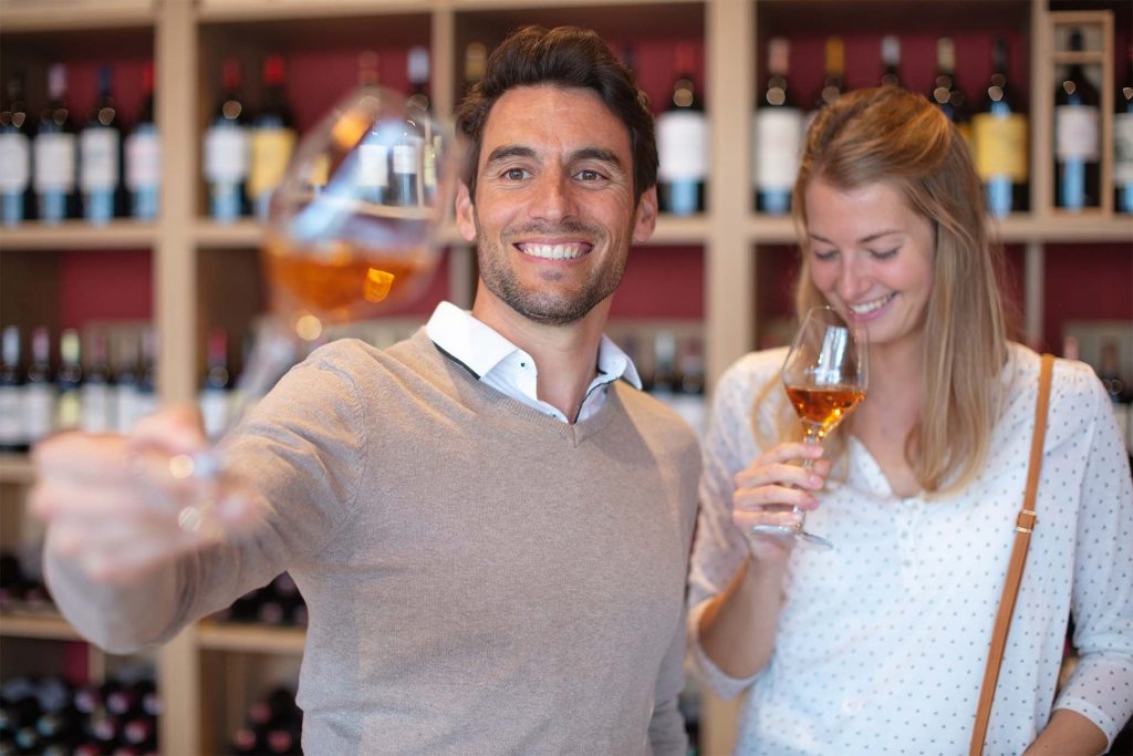 A man and woman enjoy a whisky tasting experience