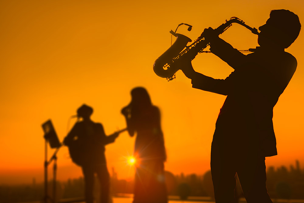 Jazz performers perform outside.
