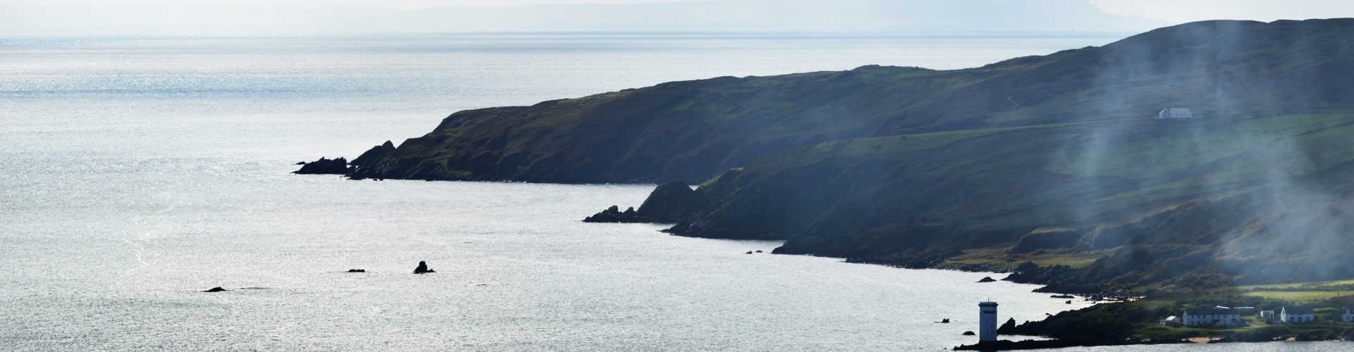 Panoramic aerial view of rocky shores, valleys and hills of isle of Islay.