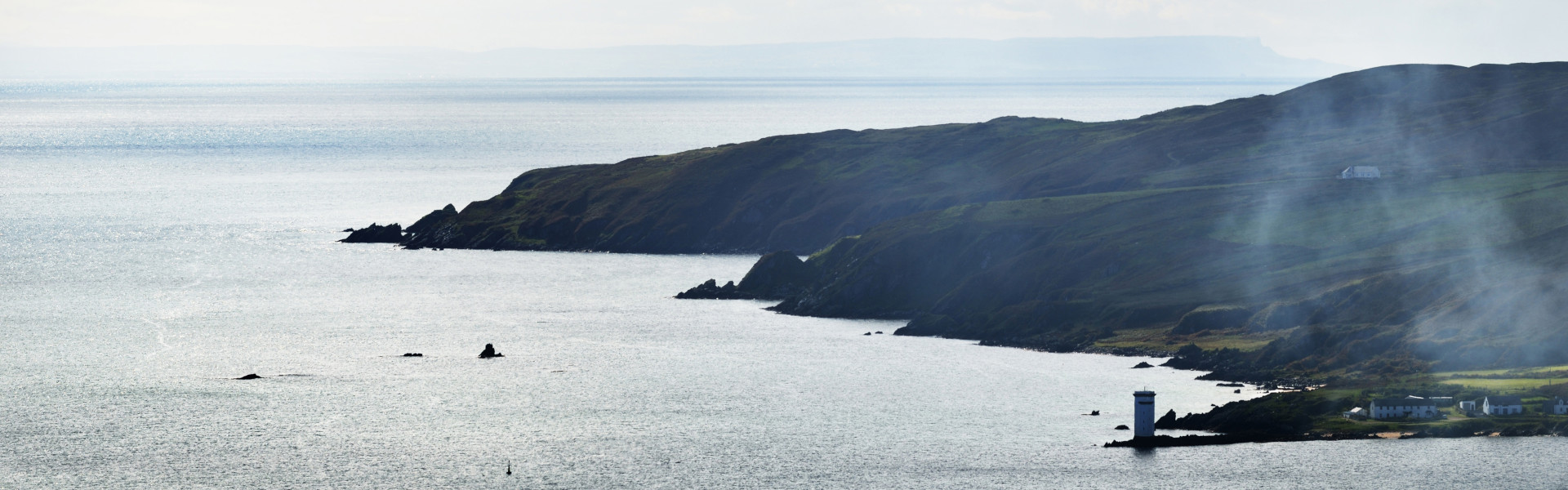 Panoramic aerial view of rocky shores, valleys and hills of isle of Islay.