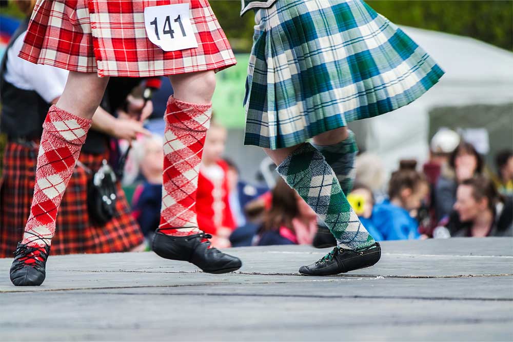 Competitors in Highland dancing with kilts.