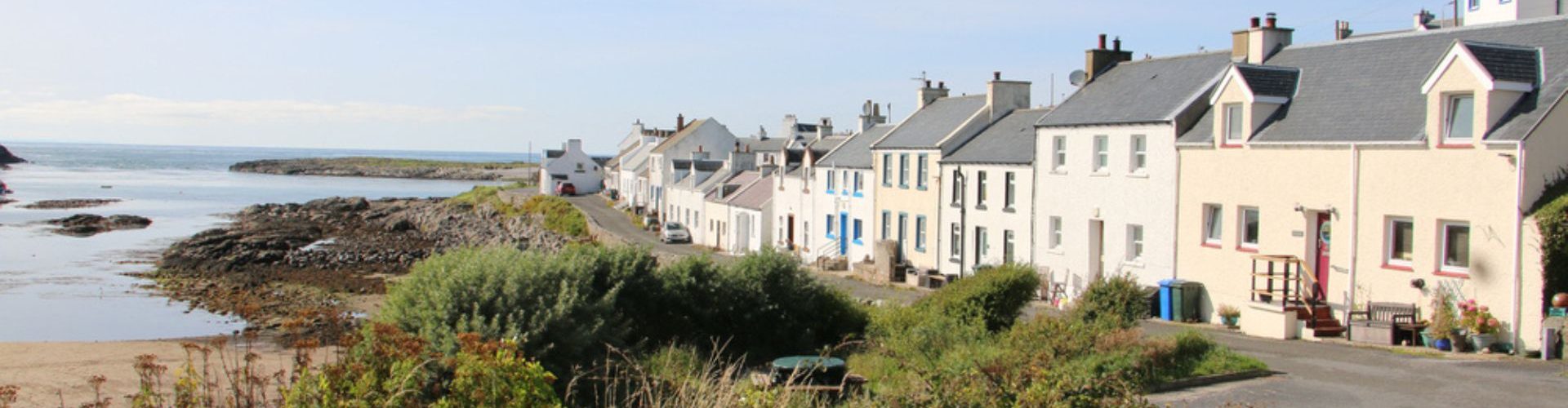 Houses on the cost of Islay on a cold winters day