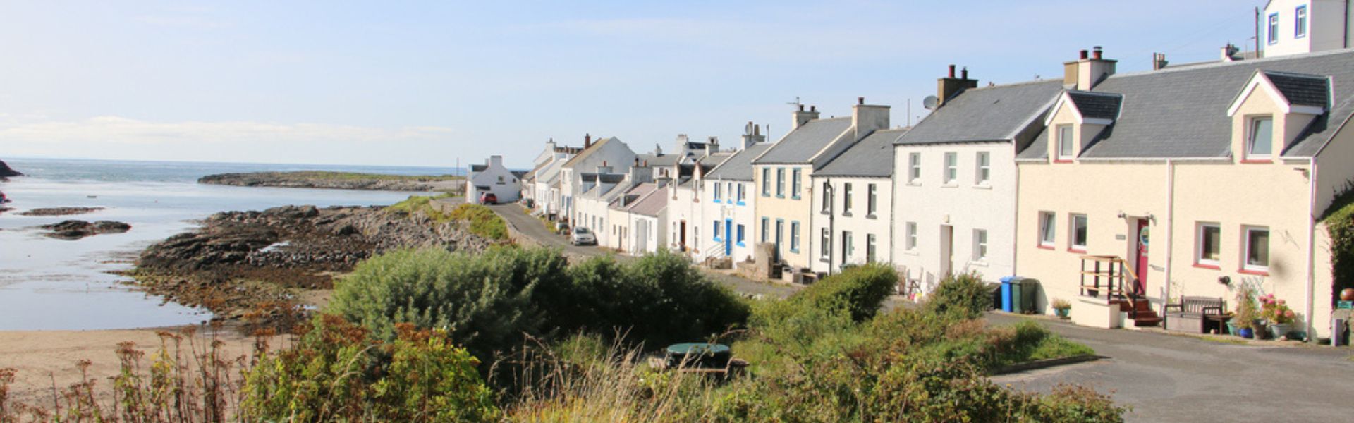 Houses on the cost of Islay on a cold winters day